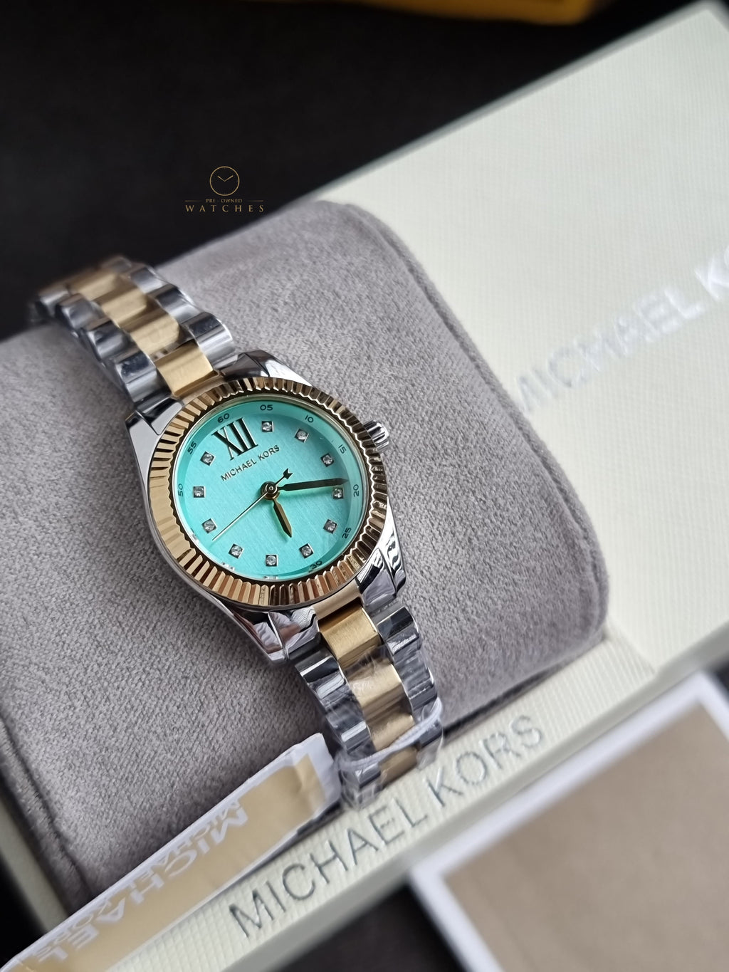 Michael Kors Petite Lexington 26mm Turquoise Dial Two Tone Stainless Steel Bracelet Watch
 MK7579