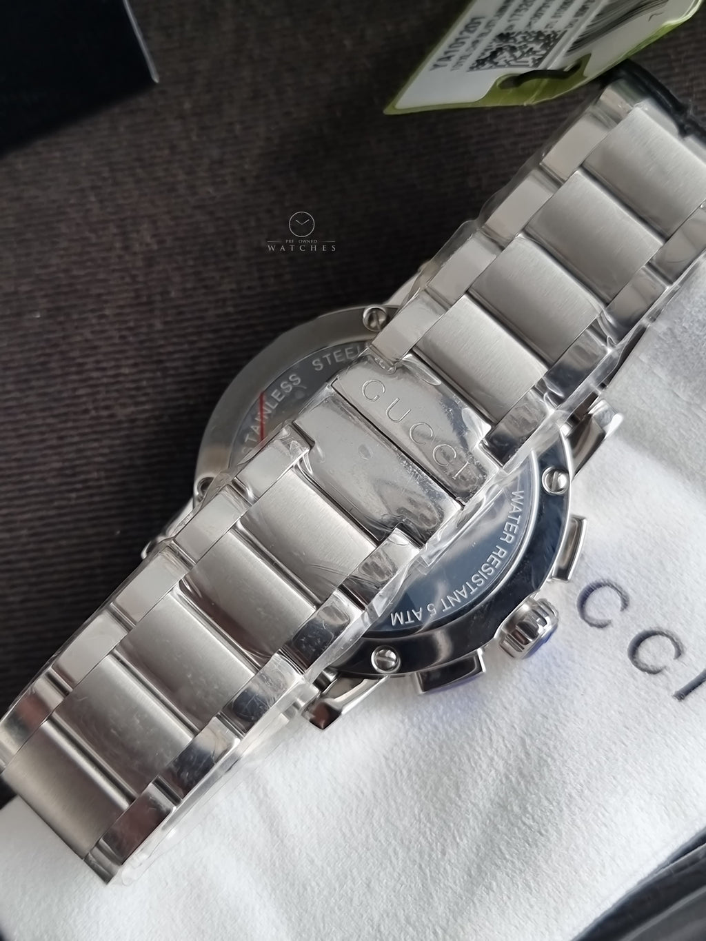 Gucci Men’s Swiss Made Quartz Stainless Steel Silver Dial 44mm Watch YA101201