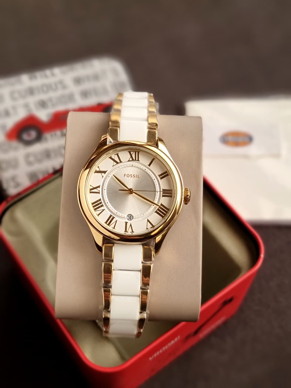 Fossil Gilmore Three-Hand Date Gold-Tone and White CE1131 Ceramic Watch