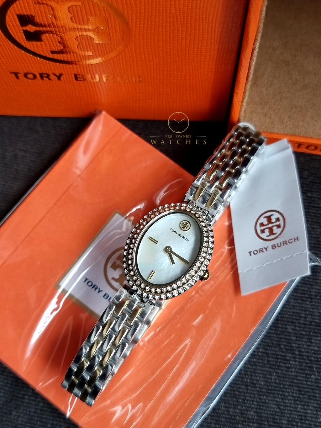 Tory Burch Women's Watch TBW6037 Quartz Oval Mother of Pearl Dial Two Tone Steel