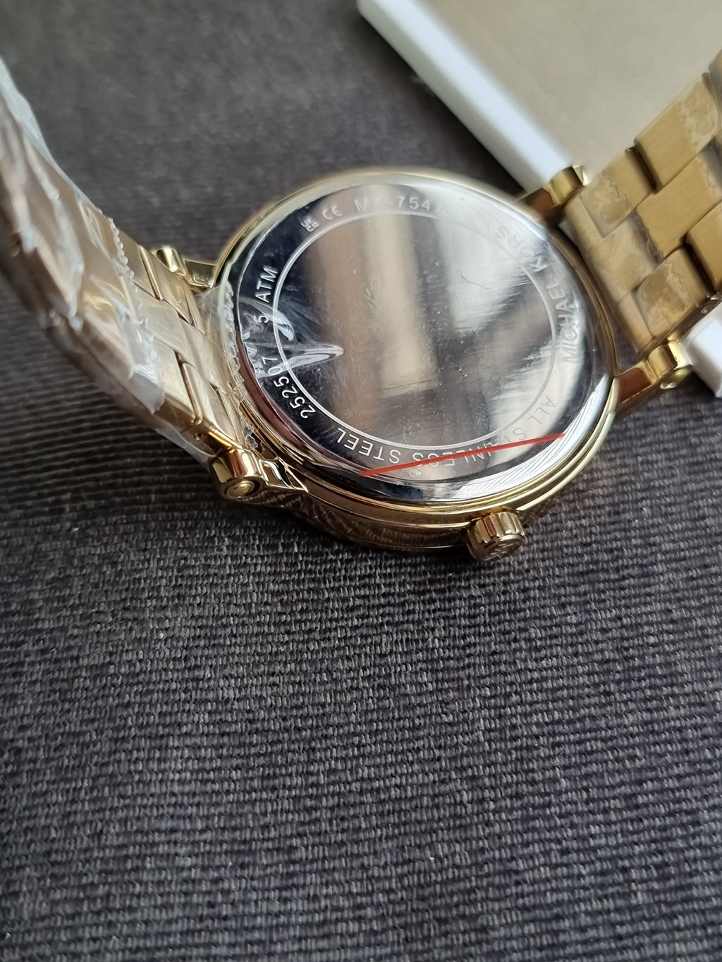 Michael Kors Women's Corey Three-Hand Gold-Tone Stainless Steel 38mm Watch 
MK7547