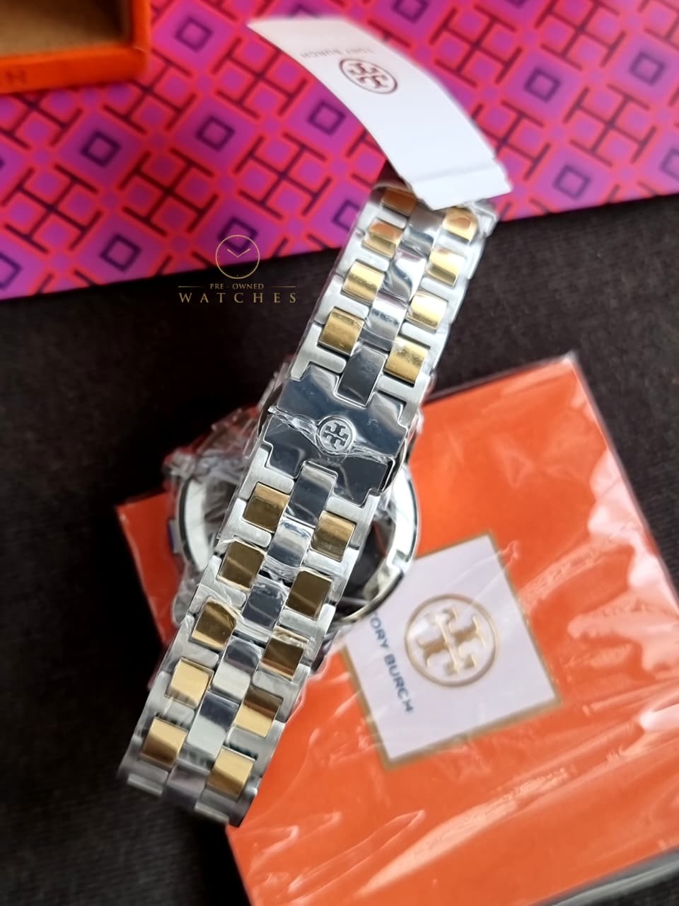 Tory Burch T-Monogram Two-Tone Stainless Steel Gold Dial Chronograph Quartz Watch For Ladies – TBW1052