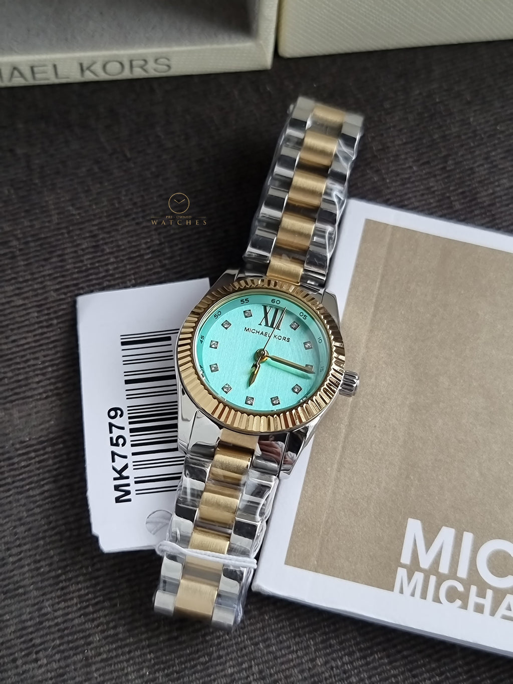 Michael Kors Petite Lexington 26mm Turquoise Dial Two Tone Stainless Steel Bracelet Watch
 MK7579