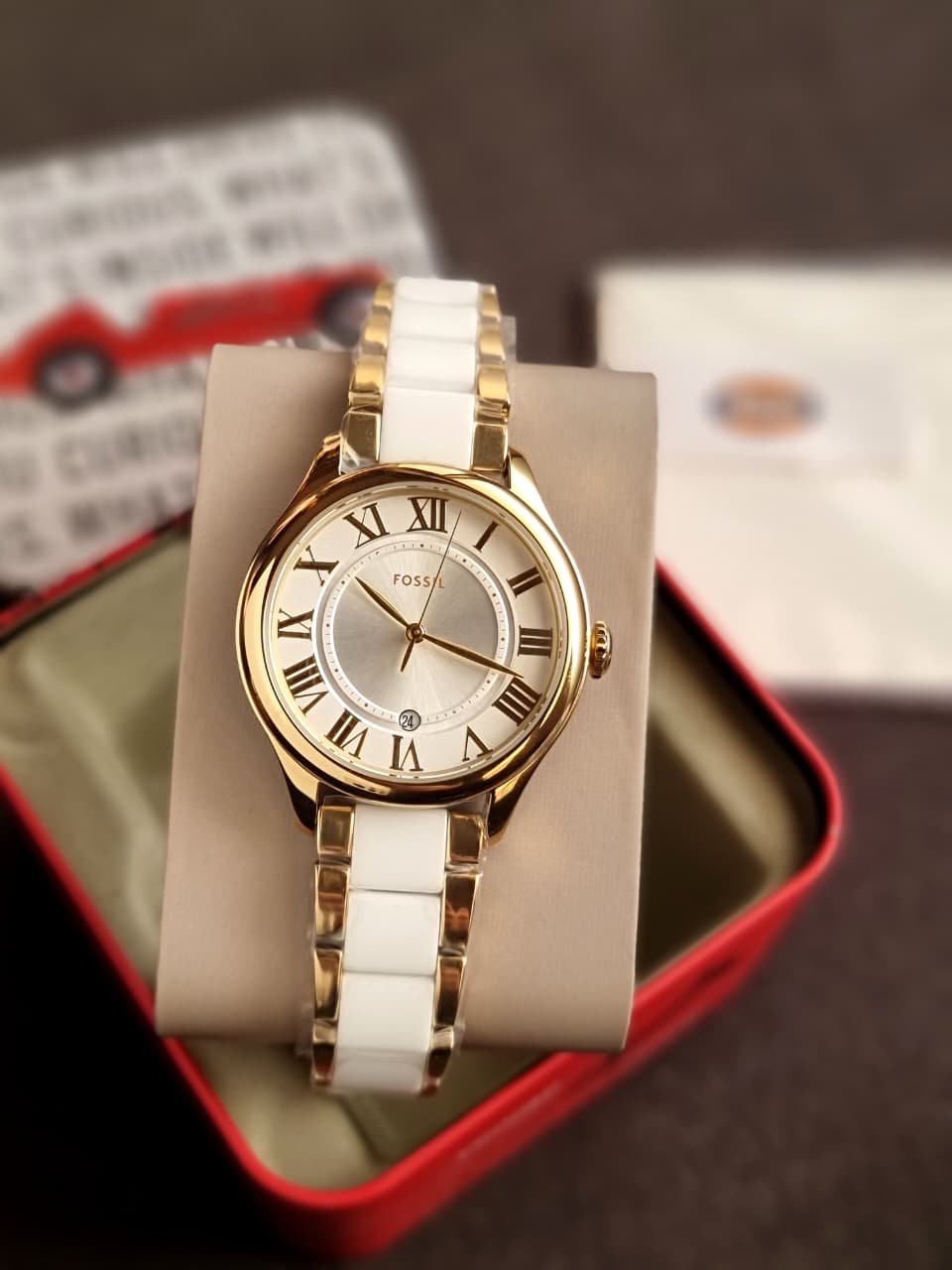 Fossil Gilmore Three-Hand Date Gold-Tone and White CE1131 Ceramic Watch