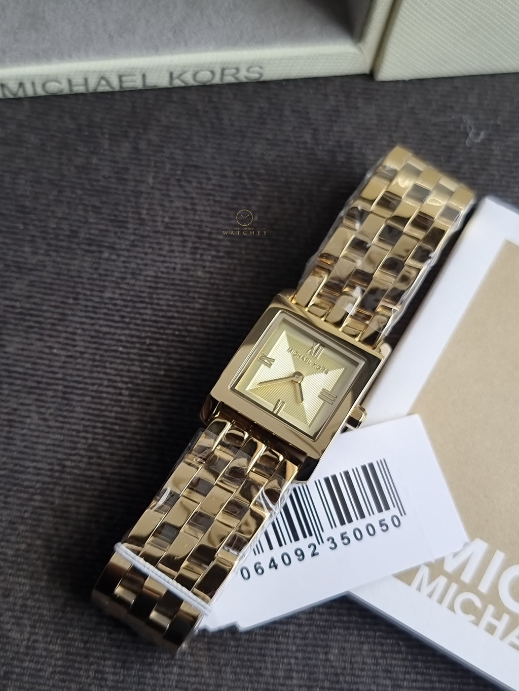 Michael Kors Micro Georgie Quartz Gold Dial Ladies Watch
MK4931