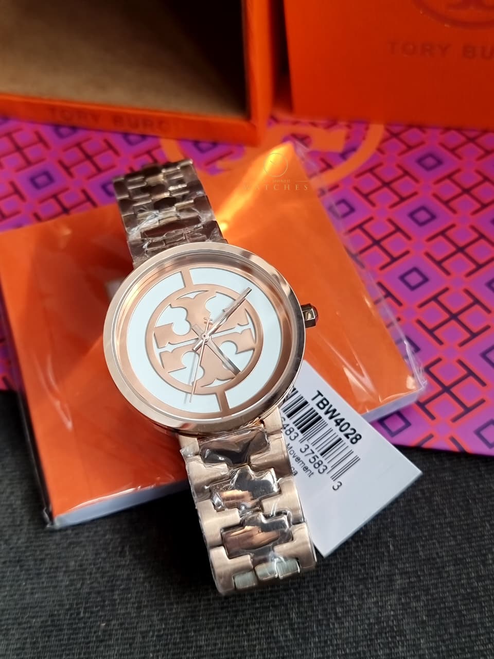 Tory Burch Reva Rose Gold Stainless Steel Rose Gold Dial Quartz Watch for Ladies - TBW4028