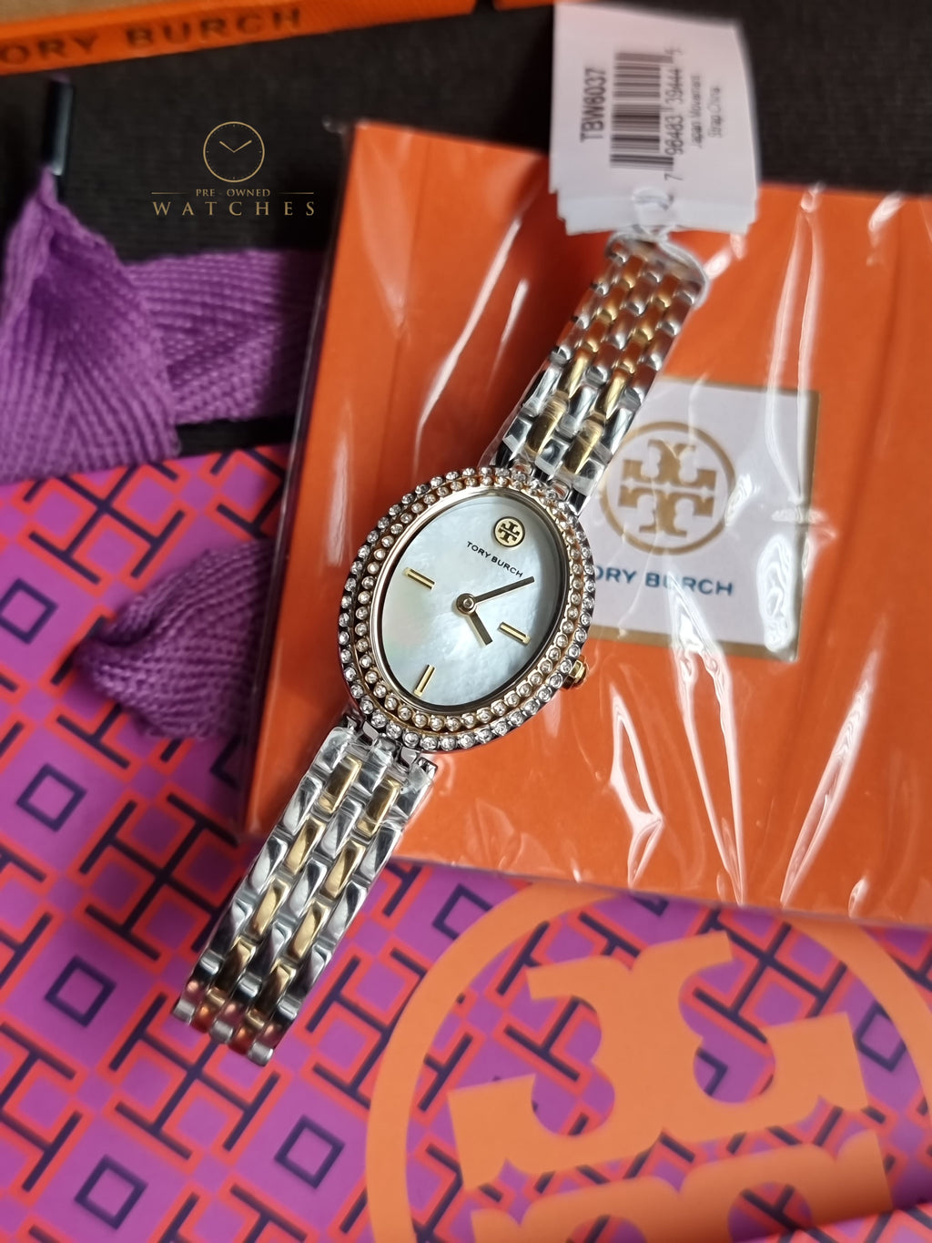 Tory Burch Women's Watch TBW6037 Quartz Oval Mother of Pearl Dial Two Tone Steel