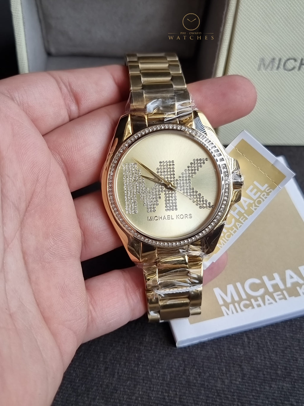 Michael Kors Women’s Quartz Stainless Steel Gold Dial 43mm Watch MK6555