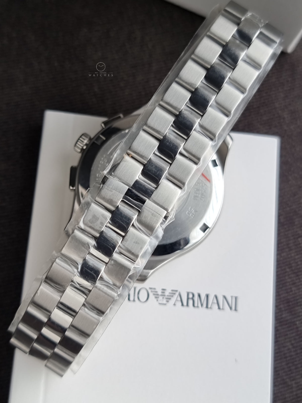 Emporio Armani Silver Stainless Steel Black 42mm Dial Chronograph Quartz Watch for Gents -  AR11691
(Without Tag)