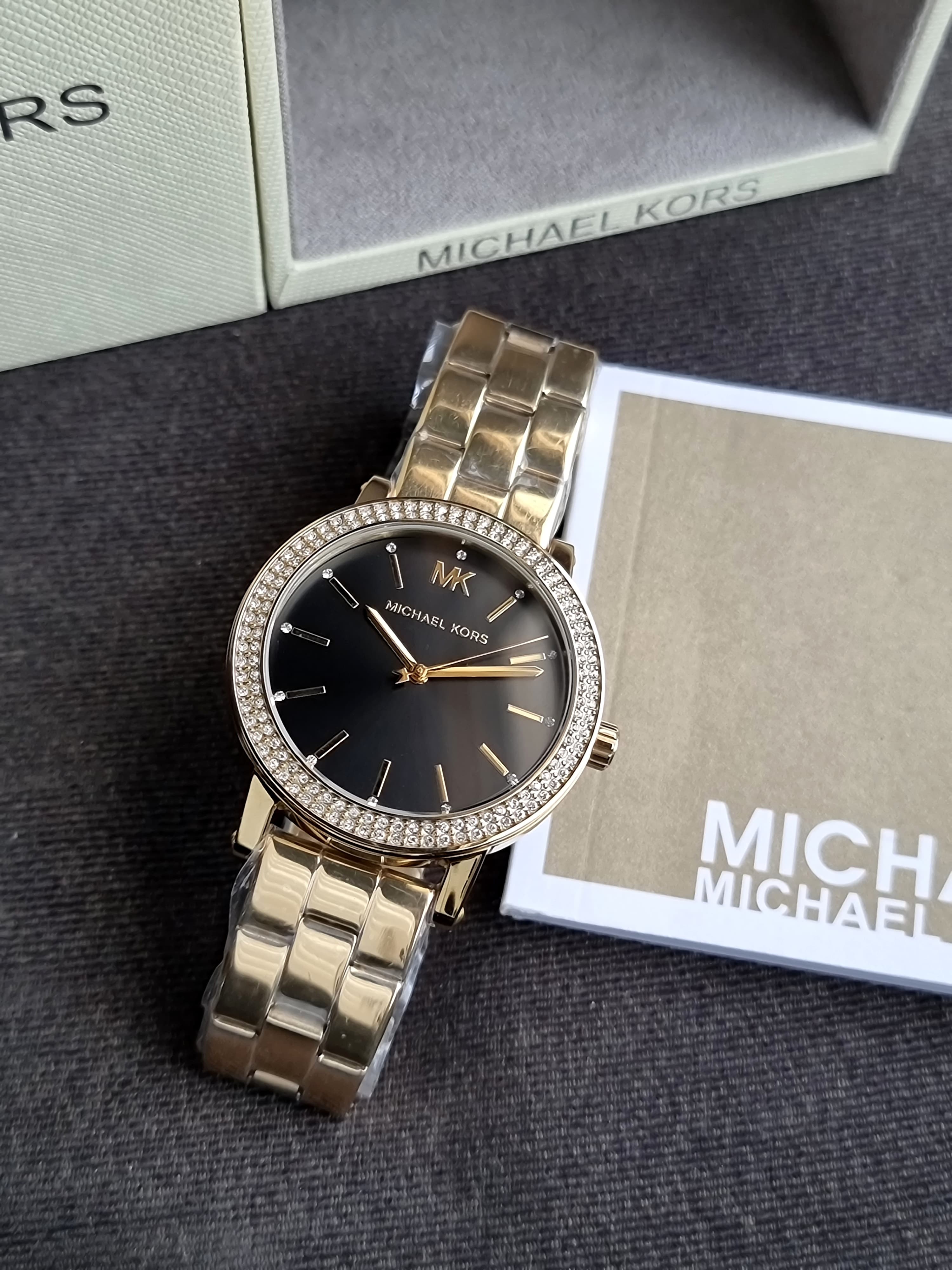 Michael Kors Women's Corey Three-Hand Gold-Tone Stainless Steel 38mm Watch 
MK7547