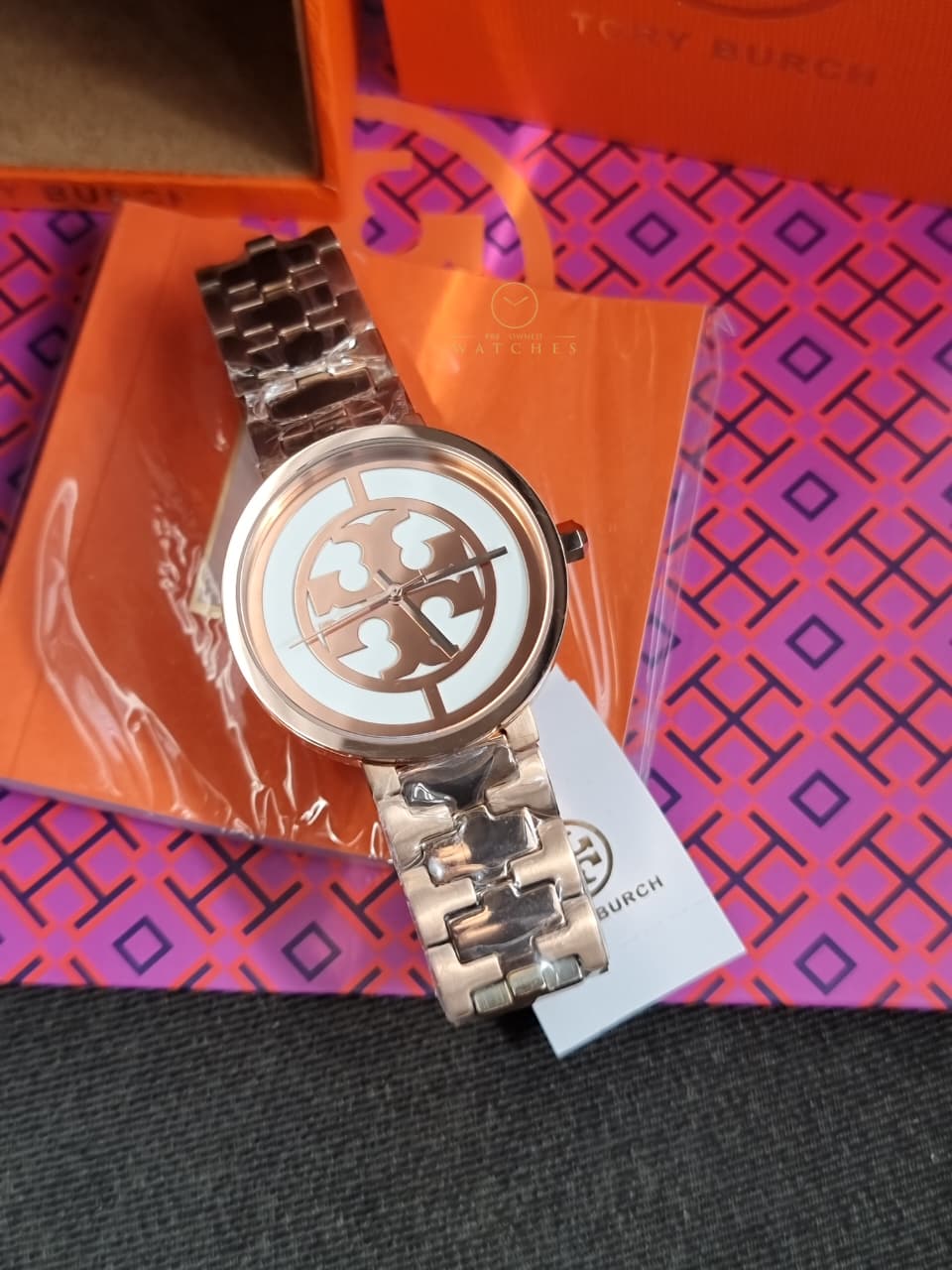 Tory Burch Reva Rose Gold Stainless Steel Rose Gold Dial Quartz Watch for Ladies - TBW4028