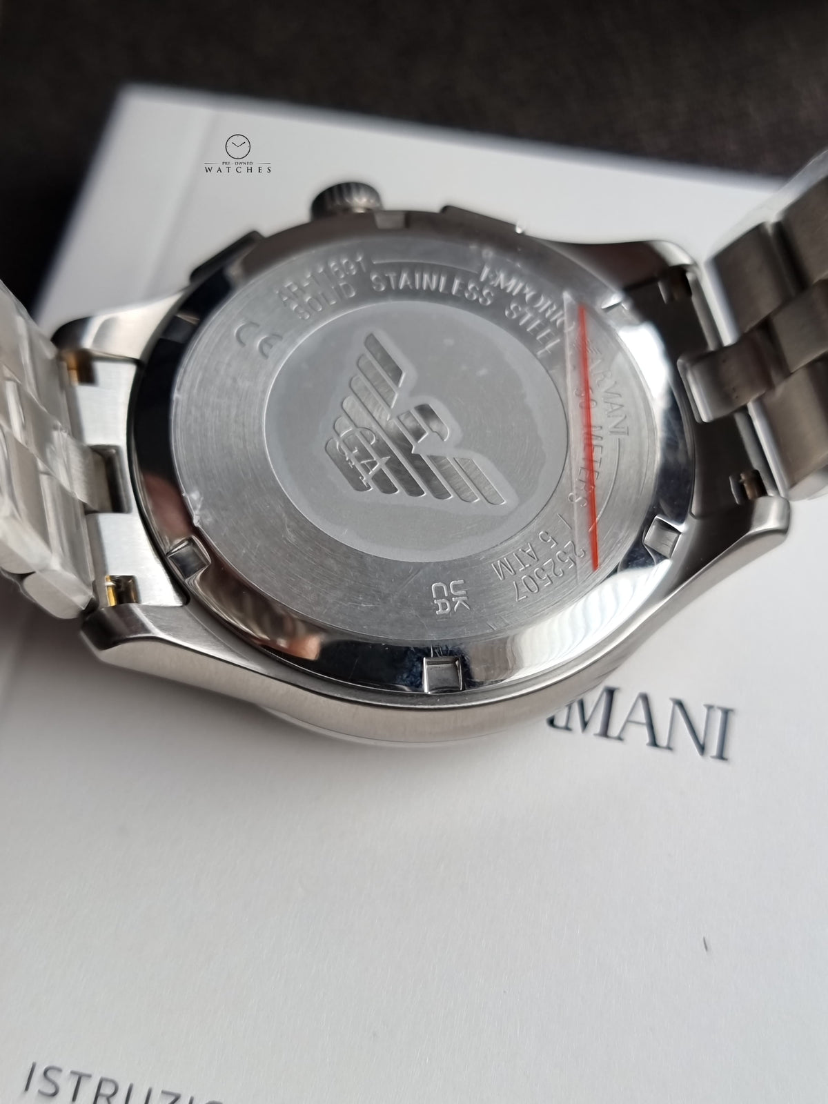 Emporio Armani Silver Stainless Steel Black 42mm Dial Chronograph Quartz Watch for Gents -  AR11691
(Without Tag)