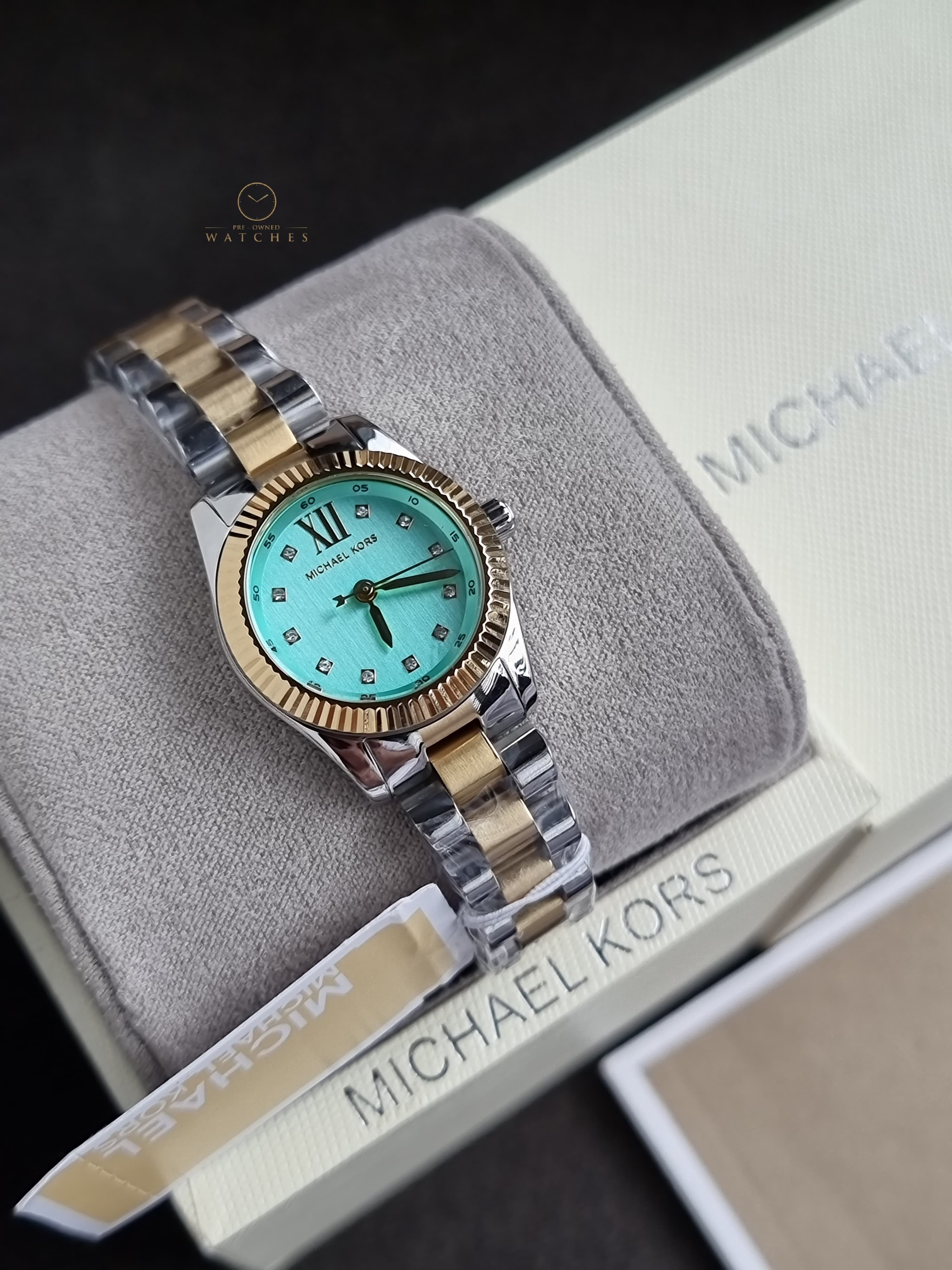 Michael Kors Petite Lexington 26mm Turquoise Dial Two Tone Stainless Steel Bracelet Watch
 MK7579