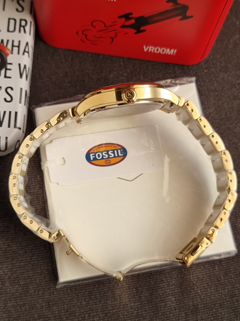Fossil Gilmore Three-Hand Date Gold-Tone and White CE1131 Ceramic Watch