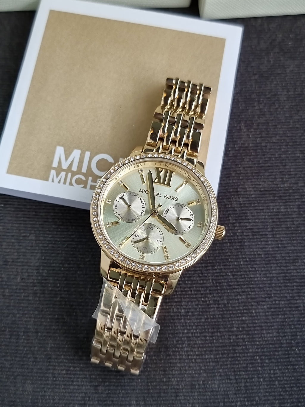 Michael Kors  MKO1080
Melissa Pavé Gold-Tone Watch
