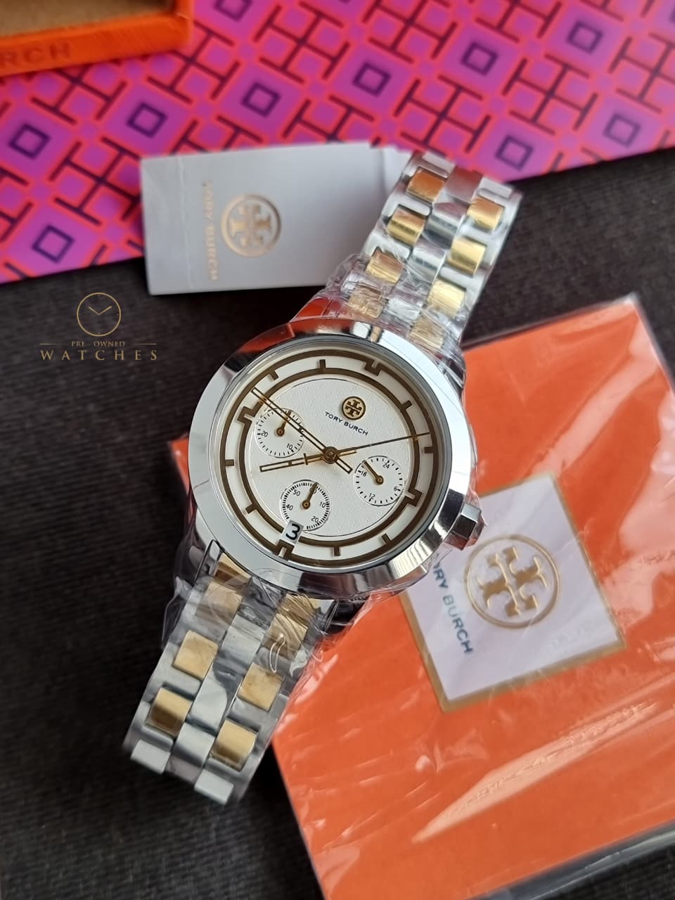 Tory Burch T-Monogram Two-Tone Stainless Steel Gold Dial Chronograph Quartz Watch For Ladies – TBW1052