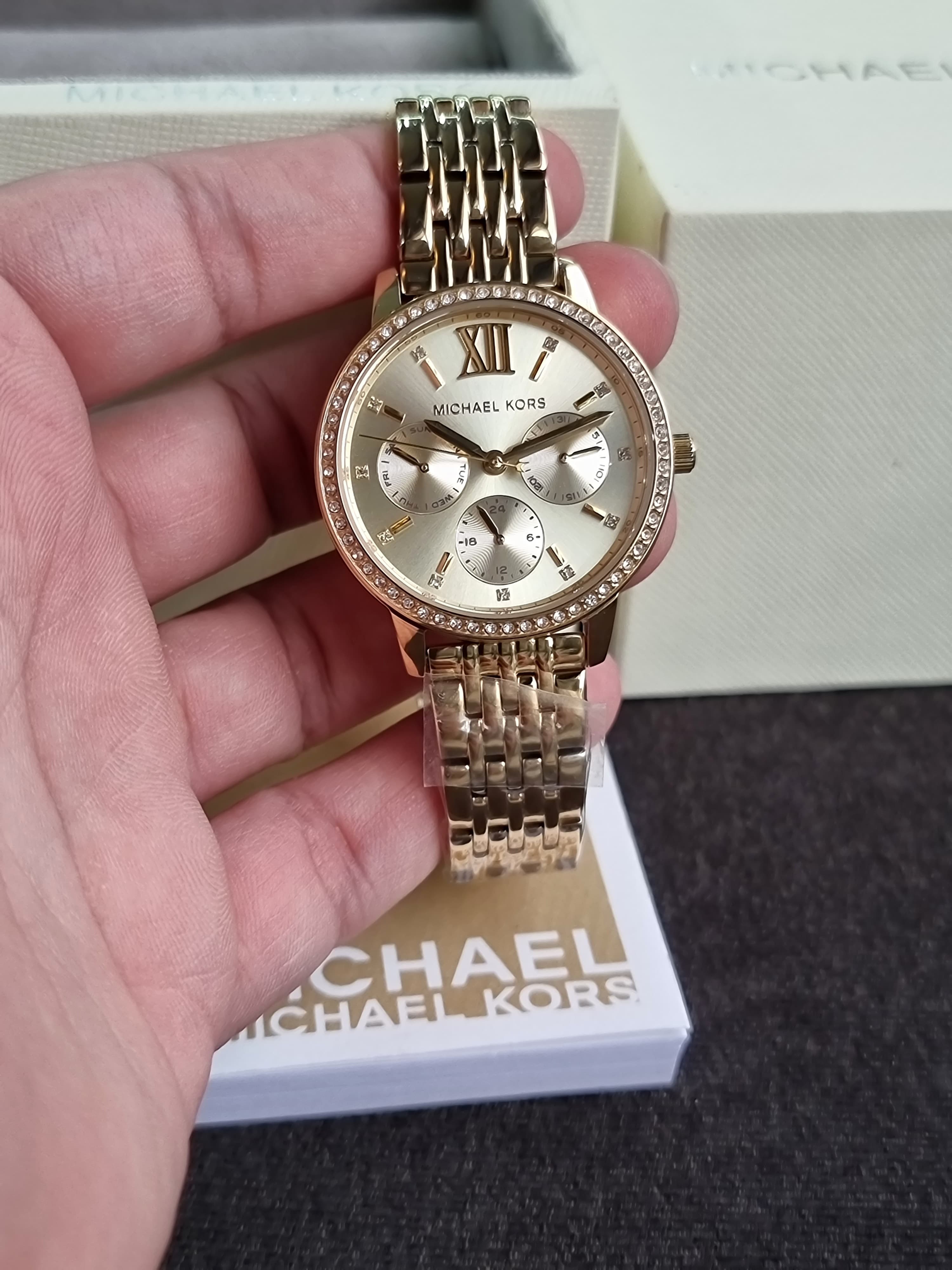 Michael Kors  MKO1080
Melissa Pavé Gold-Tone Watch