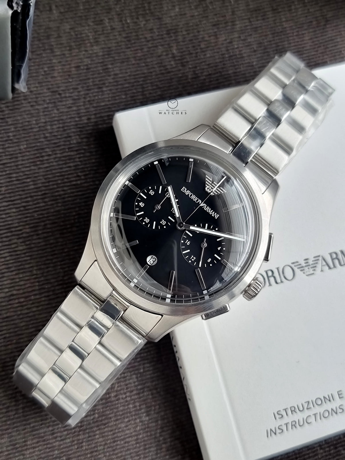 Emporio Armani Silver Stainless Steel Black 42mm Dial Chronograph Quartz Watch for Gents -  AR11691
(Without Tag)