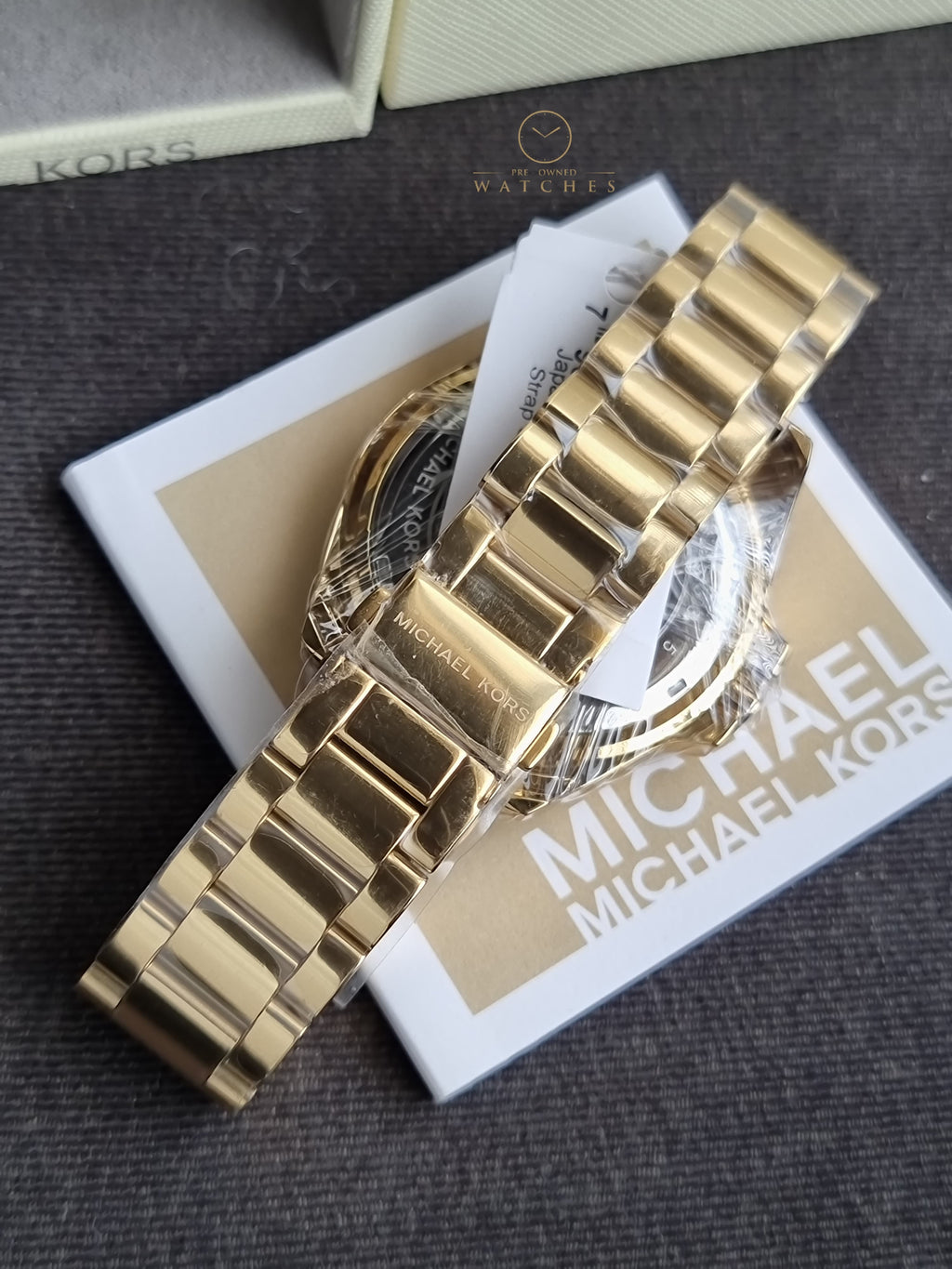 Michael Kors Women’s Quartz Stainless Steel Gold Dial 43mm Watch MK6555