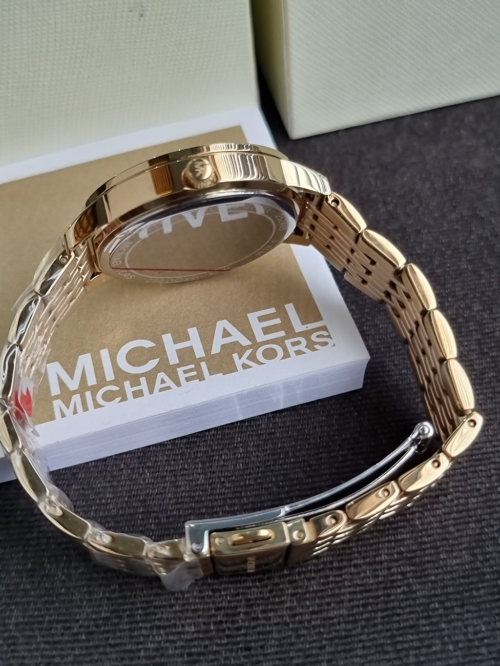 Michael Kors  MKO1080
Melissa Pavé Gold-Tone Watch