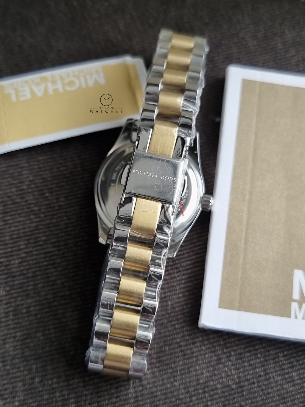 Michael Kors Petite Lexington 26mm Turquoise Dial Two Tone Stainless Steel Bracelet Watch
 MK7579