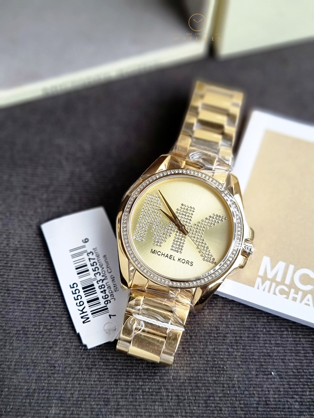 Michael Kors Women’s Quartz Stainless Steel Gold Dial 43mm Watch MK6555
