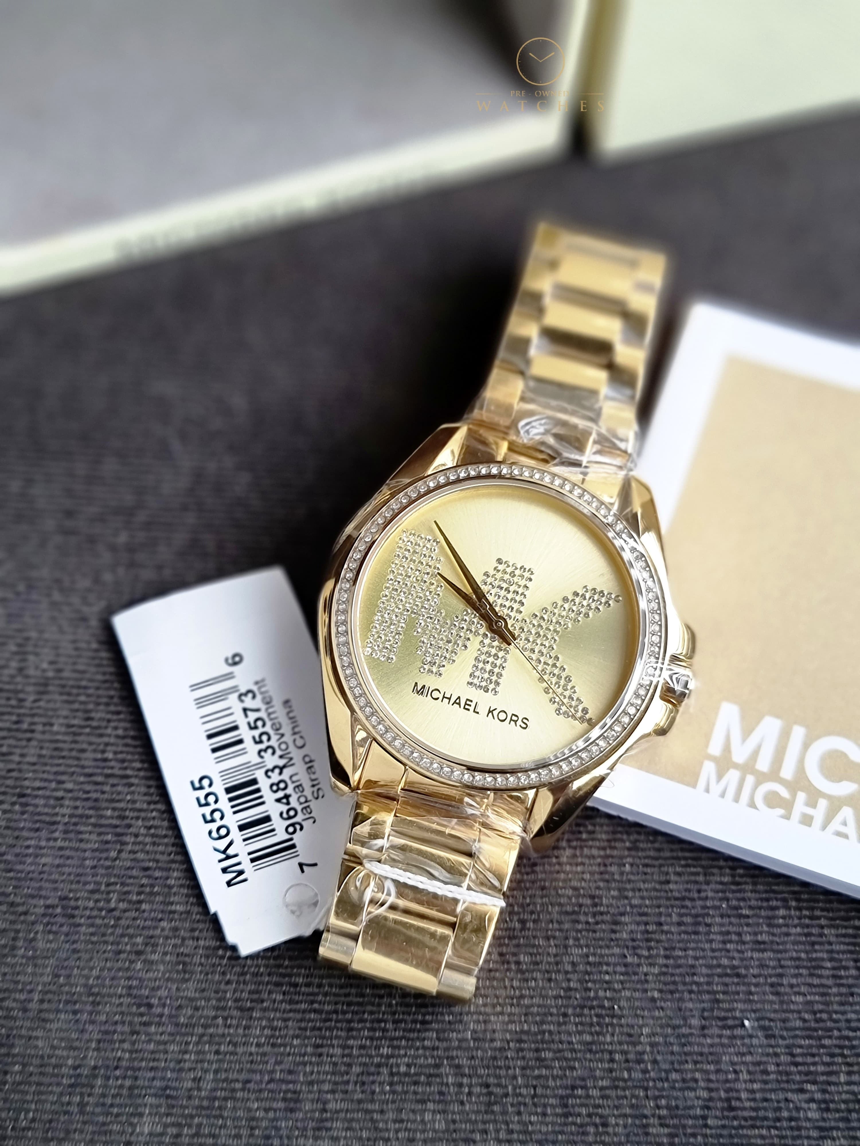 Michael Kors Women’s Quartz Stainless Steel Gold Dial 43mm Watch MK6555