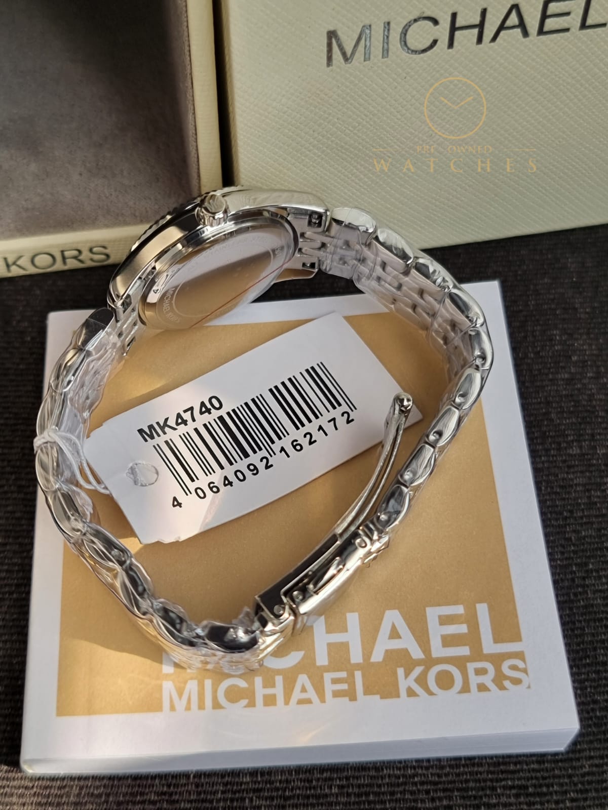 Michael Kors 
Lexington Quartz Crystal White Dial Two-Tone Ladies Watch
MK4740