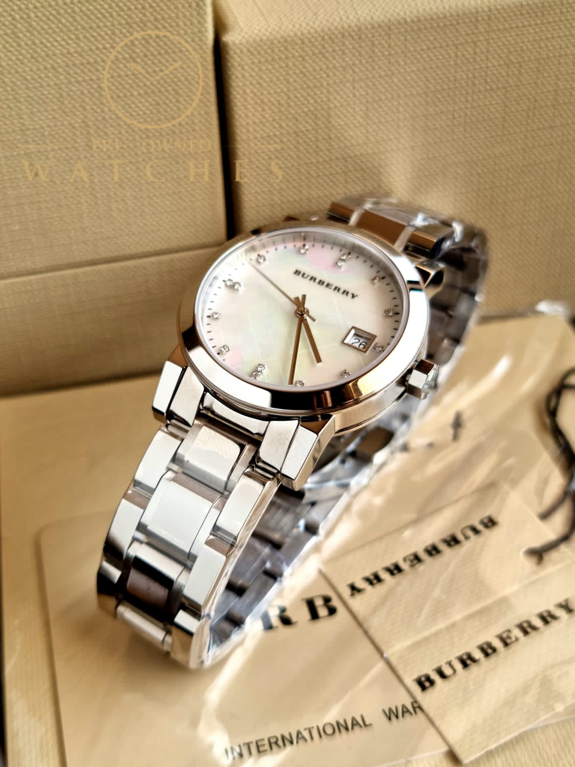 Burberry Women’s Swiss Made Quartz Stainless Steel Silver Dial 34mm Watch BU9125