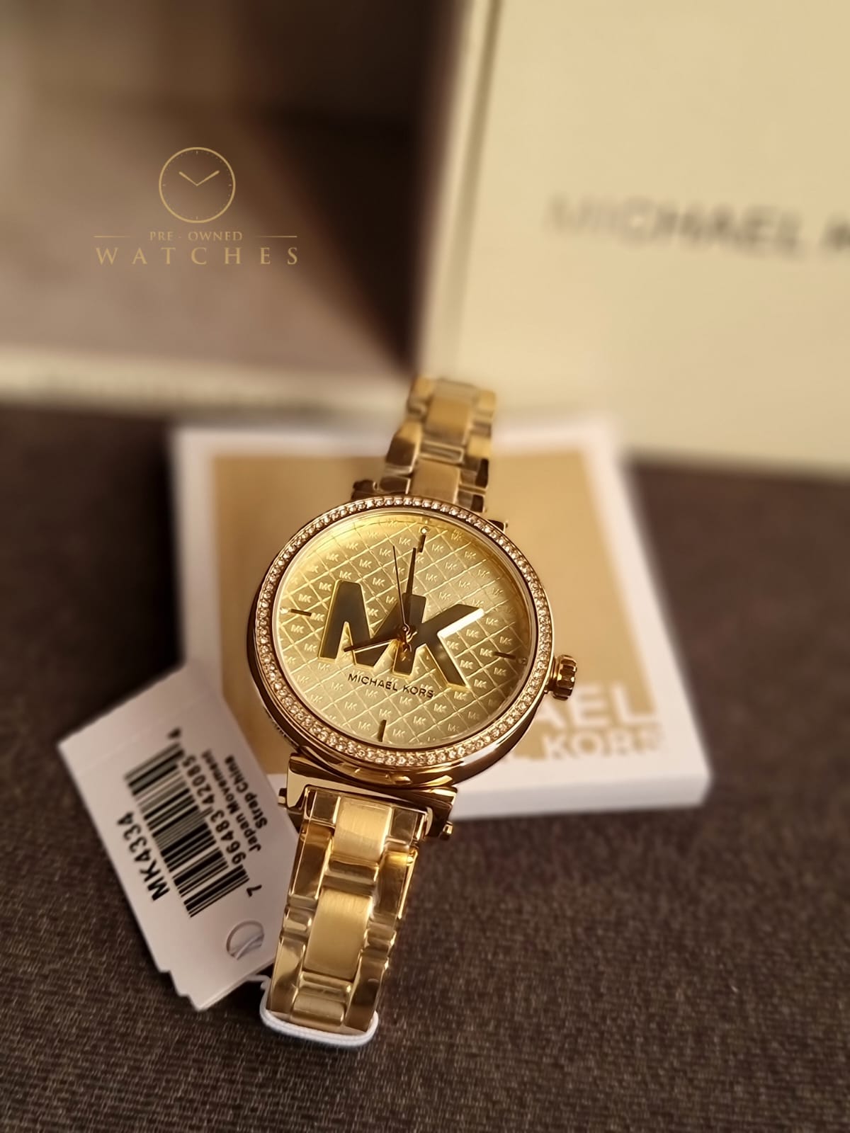 Michael Kors Women’s Quartz Stainless Steel Gold Dial 36mm Watch MK4334