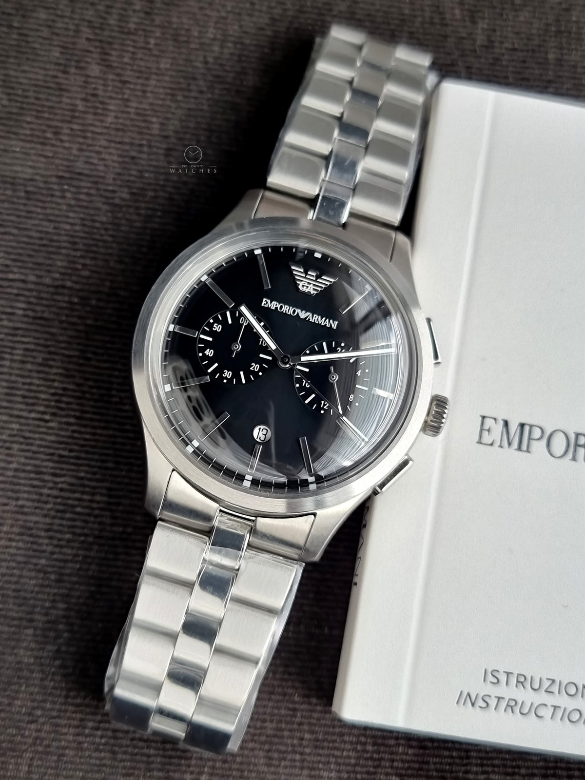 Emporio Armani Silver Stainless Steel Black 42mm Dial Chronograph Quartz Watch for Gents -  AR11691
(Without Tag)