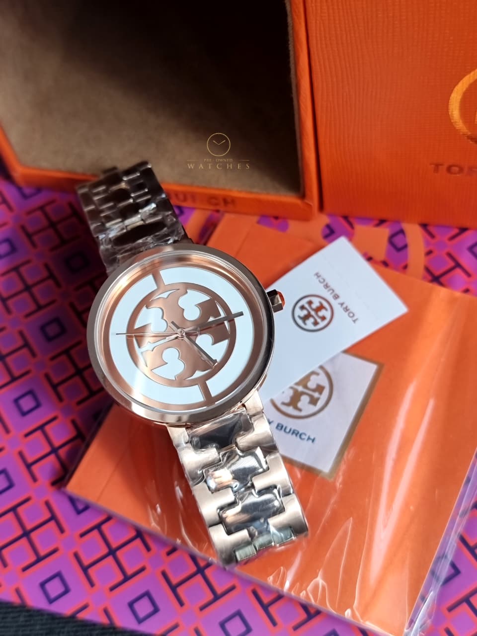 Tory Burch Reva Rose Gold Stainless Steel Rose Gold Dial Quartz Watch for Ladies - TBW4028