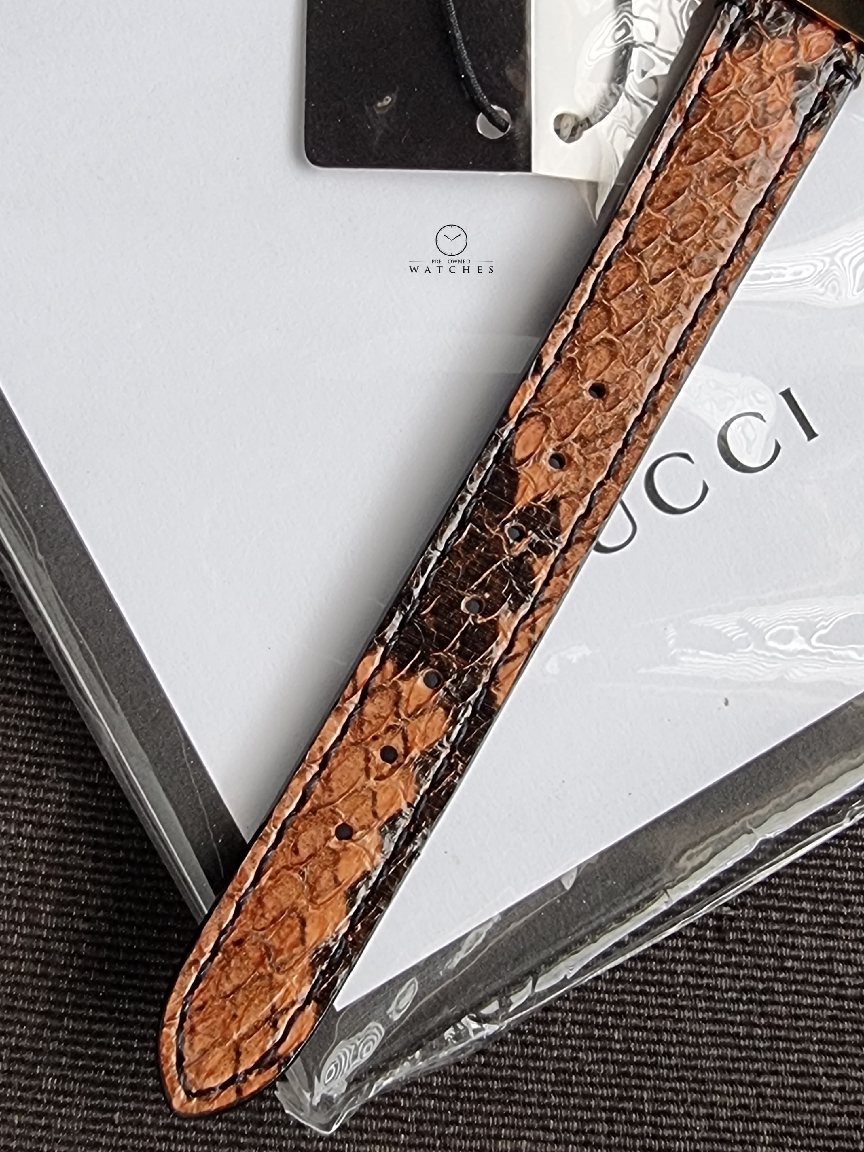 Gucci Women’s Swiss Made Quartz Brown Leather Strap Multi Color Dial 21mm Watch YA147402